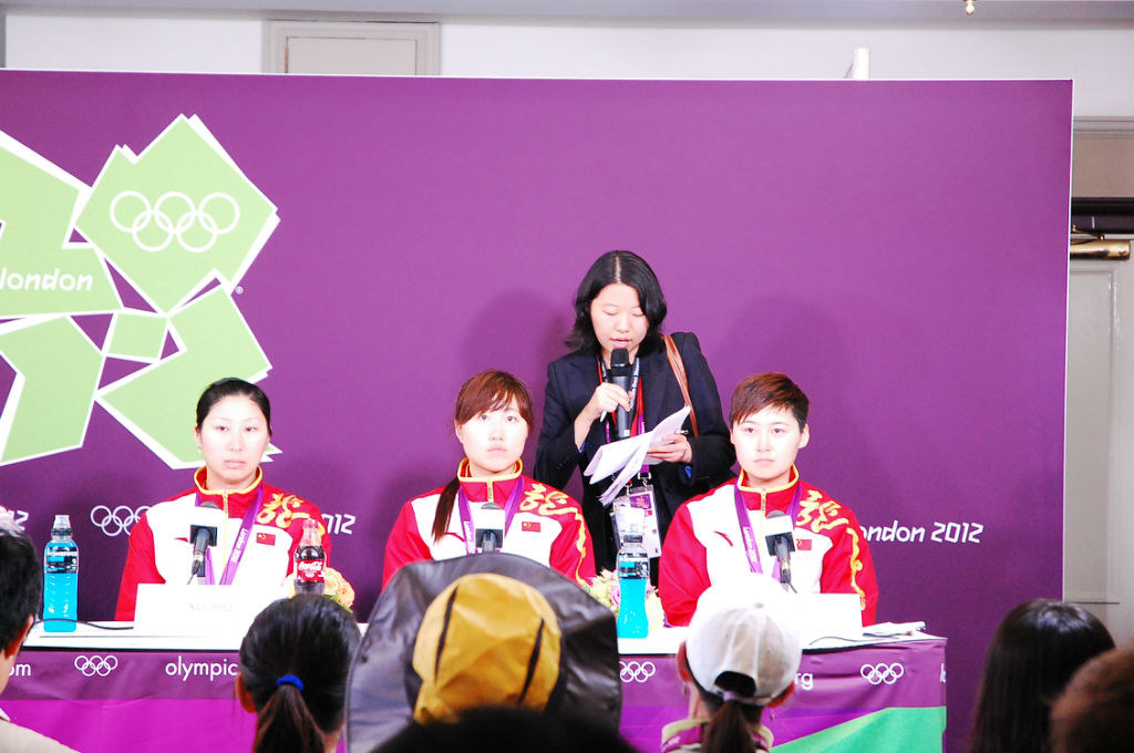 Interpreting at a post-event press conference at the London Olympics