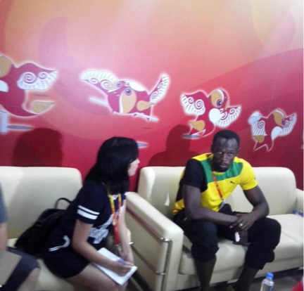 With athlete Usain Bolt